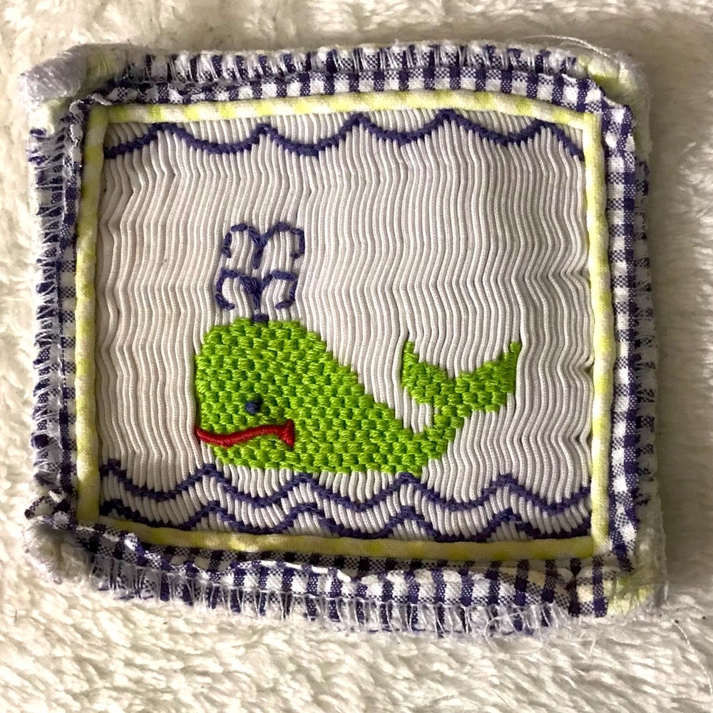 Hand smocked whale insert put in a tee shirt shorts swim dress pocket crafts